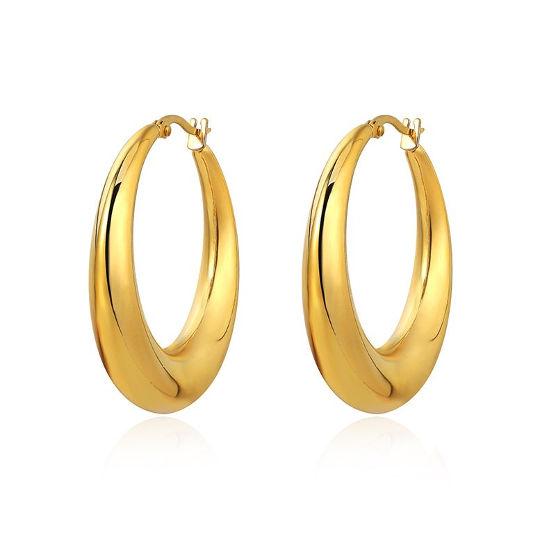 Metal round hoop earrings - elegant and simple, with a small and exclusive design touch. Luxurious and gold-colored accessory. - Image 4